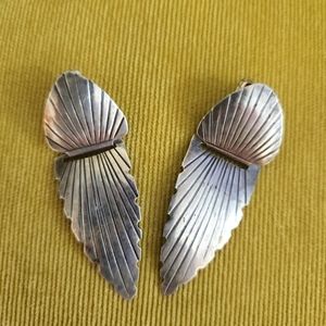 Sterling Silver hinged earrings.
